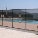 Protective pool fence with mesh