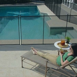 Protective pool fence with mesh